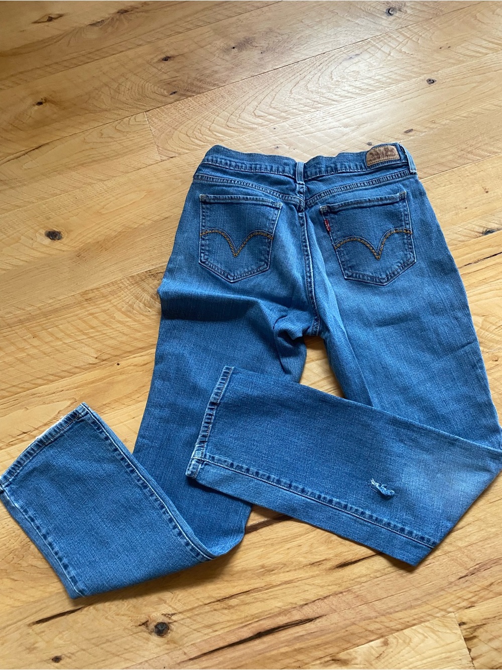 Levi’s 505 straight leg western distressed jeans